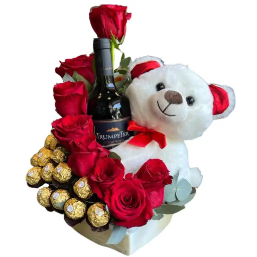 Arreglo de flores rosas importadas con vino bombones y peluche 